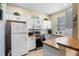 Functional kitchen with white cabinets and sleek countertops at 624 Terra Lago St, Davenport, FL 33897