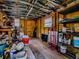 Interior of backyard shed with lots of storage space and a window for natural light at 6731 Lake Griffin Rd, Lady Lake, FL 32159