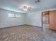 Living room showcasing a view into the kitchen and breakfast nook at 6731 Lake Griffin Rd, Lady Lake, FL 32159