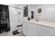 Contemporary bathroom with themed decor, featuring a shower-tub combination and coordinated accessories at 709 Longboat Dr, Davenport, FL 33896