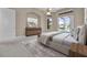 Main bedroom features a tray ceiling, an ensuite bathroom, and pool views at 7303 Spring Mountain Ln, Yalaha, FL 34797