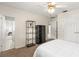 Bedroom featuring carpet flooring, a window, and multiple doorways to other rooms at 81 N Carol Ave, Mascotte, FL 34753