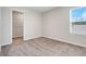 Bedroom featuring plush carpet and an closet, providing a peaceful and comfortable space at 853 Blue Creek Dr, Haines City, FL 33844