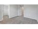 Cozy bedroom featuring plush carpet and a walk-in closet for ample storage space at 853 Blue Creek Dr, Haines City, FL 33844