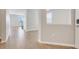 Spacious foyer with neutral walls, tile flooring, and open access to the living areas at 853 Blue Creek Dr, Haines City, FL 33844