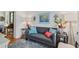 Cozy living room with a comfortable sofa, stylish decor, and hardwood floors at 9233 Silver Lake Dr, Leesburg, FL 34788