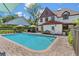 Spacious pool with a brick paver surround and a view of the backyard and house at 9233 Silver Lake Dr, Leesburg, FL 34788