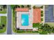 Bird's eye view of a community pool area featuring a rectangular pool, plenty of lounge chairs, and shade at 926 Saint Andrews Blvd, Lady Lake, FL 32159