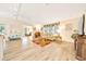 Inviting living area featuring a seamless flow and modern decor at 926 Saint Andrews Blvd, Lady Lake, FL 32159