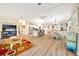 Spacious open-concept living space with a modern kitchen at 926 Saint Andrews Blvd, Lady Lake, FL 32159