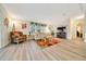 Cozy living room with comfortable seating and natural light at 926 Saint Andrews Blvd, Lady Lake, FL 32159