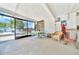 Bright sunroom with ample seating and serene outdoor views, perfect for relaxation at 926 Saint Andrews Blvd, Lady Lake, FL 32159