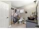 Bathroom featuring vessel sink, framed mirror, toilet, and a shower with modern curtain at 9790 Se 175Th St, Summerfield, FL 34491