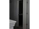 Bathroom featuring dark cabinetry and neutral walls at 1138 Calico Pointe Cir, Groveland, FL 34736