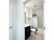 Modern bathroom featuring a sink with vanity, toilet, and a shower-tub combo with stylish shower curtain at 1138 Calico Pointe Cir, Groveland, FL 34736