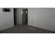 A bright, carpeted bedroom with wall-mount for TV and spacious, well-lit layout at 1138 Calico Pointe Cir, Groveland, FL 34736
