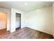 Bedroom featuring neutral carpet, white walls, a closet, and plenty of space for furniture at 1138 Calico Pointe Cir, Groveland, FL 34736