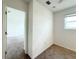 Carpeted bedroom with natural light and minimal decor, offering a blank canvas at 1138 Calico Pointe Cir, Groveland, FL 34736