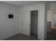 The well-lit bedroom offers ample closet space and includes a TV mount at 1138 Calico Pointe Cir, Groveland, FL 34736