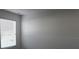 Natural light fills the bedroom with modern window treatments, enhancing the appeal at 1138 Calico Pointe Cir, Groveland, FL 34736