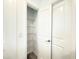 Walk-in closet with metal shelving for organized storage space at 1138 Calico Pointe Cir, Groveland, FL 34736