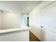 Bright upstairs hallway with neutral carpet at 1138 Calico Pointe Cir, Groveland, FL 34736