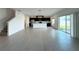 Spacious kitchen featuring an island, stainless steel appliances, and dark cabinetry at 1138 Calico Pointe Cir, Groveland, FL 34736