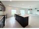 Kitchen with an island at 1138 Calico Pointe Cir, Groveland, FL 34736
