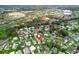 Aerial view of home with surrounding community, nearby amenities and roadways at 1142 W Boone Ct, Lady Lake, FL 32159