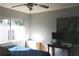Bright bedroom with large window and a desk at 1202 Deidrich Ct, Eustis, FL 32726