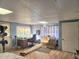 Bright bedroom with laminate floors, featuring a large desk and ample closet space at 1202 Deidrich Ct, Eustis, FL 32726