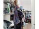 Walk-in closet providing ample storage space and a variety of organizational options for clothing and accessories at 1478 Erika Pl, The Villages, FL 32163