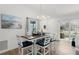 The dining area has seating for six and sliding glass doors at 1478 Erika Pl, The Villages, FL 32163