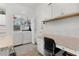 The laundry area includes a washer, dryer and built in shelving and cabinets at 1478 Erika Pl, The Villages, FL 32163