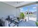 Cozy porch with comfortable seating, views of the surrounding neighborhood, and a relaxing outdoor atmosphere at 1478 Erika Pl, The Villages, FL 32163
