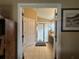Bathroom showcasing a glass-enclosed shower, vanity area, and tiled flooring at 15509 Markham Dr, Clermont, FL 34714
