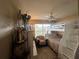 A neatly arranged bedroom featuring a bunk bed with a desk and chair, great use of space at 15509 Markham Dr, Clermont, FL 34714