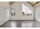 Bright bedroom featuring two large windows, a closet, and neutral color scheme at 1603 Woodward St # 18, Orlando, FL 32803