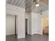 Open floor plan with concrete floors, neutral walls, and modern doorways at 1603 Woodward St # 18, Orlando, FL 32803