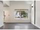 Bright living room featuring a large window and modern design elements, perfect for relaxation at 1603 Woodward St # 18, Orlando, FL 32803
