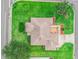 Aerial view showcasing a beautifully landscaped property, manicured lawn, and inviting curb appeal at 1948 Harston Trl, The Villages, FL 32162