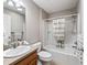 Neutral bathroom featuring a single sink vanity, a combined shower and tub and vinyl flooring at 1948 Harston Trl, The Villages, FL 32162