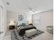 Stylishly appointed main bedroom showcasing a modern design and comfortable furnishings at 1948 Harston Trl, The Villages, FL 32162