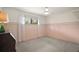 Bedroom with carpeting, a ceiling fan, and light pink paint at 2108 Dogwood Cir, Mount Dora, FL 32757