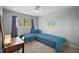 Bedroom with an L-shaped bed, carpeting, and a ceiling fan at 2108 Dogwood Cir, Mount Dora, FL 32757