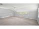 Bonus room with carpeting, lots of light, and a ceiling fan at 2108 Dogwood Cir, Mount Dora, FL 32757