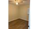 Bedroom featuring updated vinyl flooring, window, and ceiling fan at 228 Cannon Way, Casselberry, FL 32707