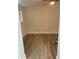 Bedroom featuring updated vinyl flooring, window, and ceiling fan at 228 Cannon Way, Casselberry, FL 32707
