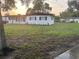 Charming home with a well-maintained lawn, updated shutters, and fresh exterior paint at 228 Cannon Way, Casselberry, FL 32707
