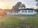 Charming home featuring a manicured lawn and a welcoming entrance, perfect for comfortable living and curb appeal at 228 Cannon Way, Casselberry, FL 32707